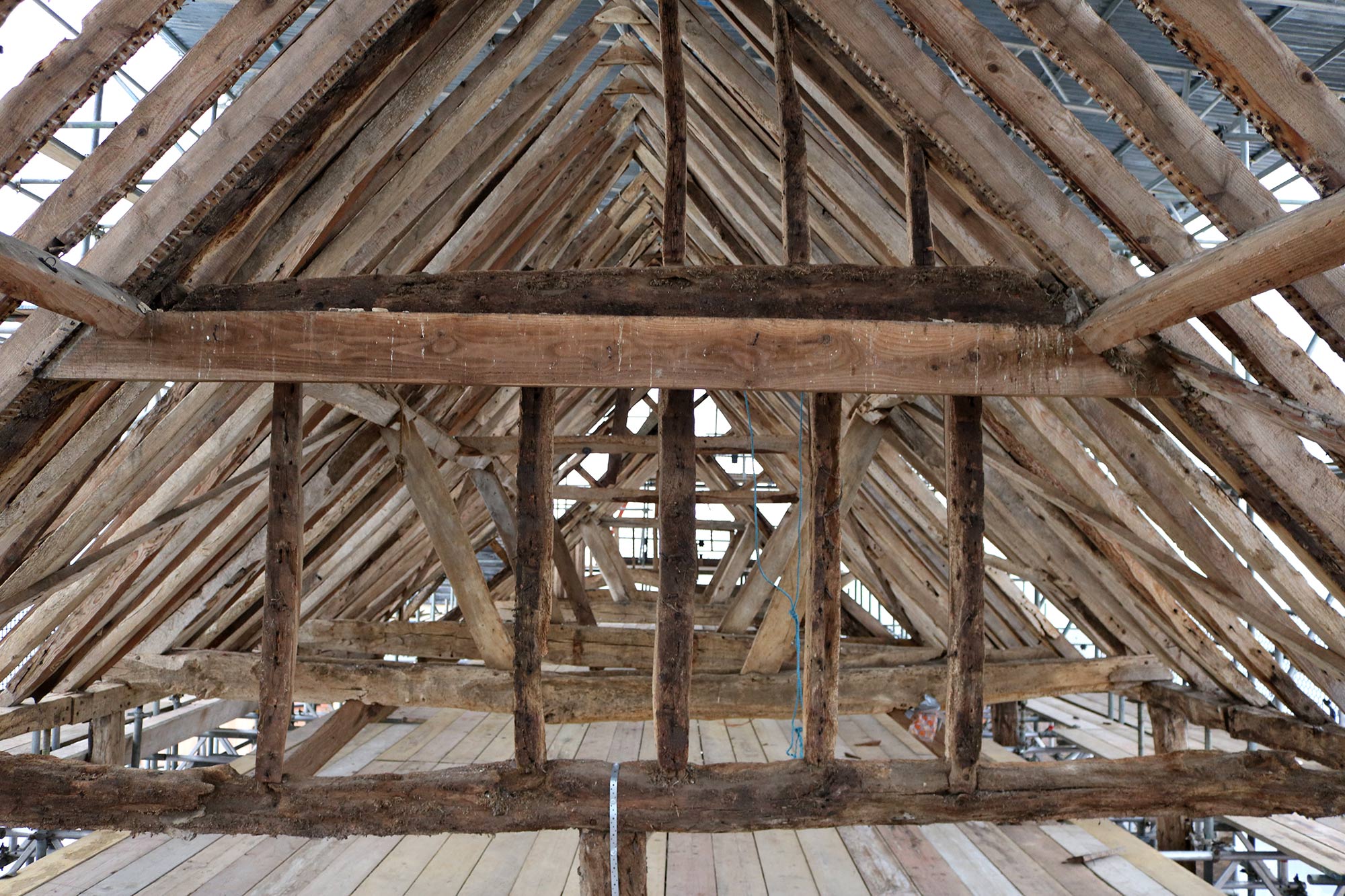 The timber roof trusses before restoration