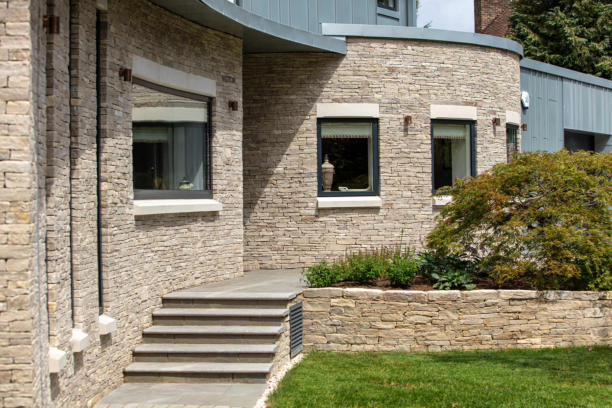 Exterior of The Zinc House. Elspeth Beard Architect. Built by KM Grant, Surrey