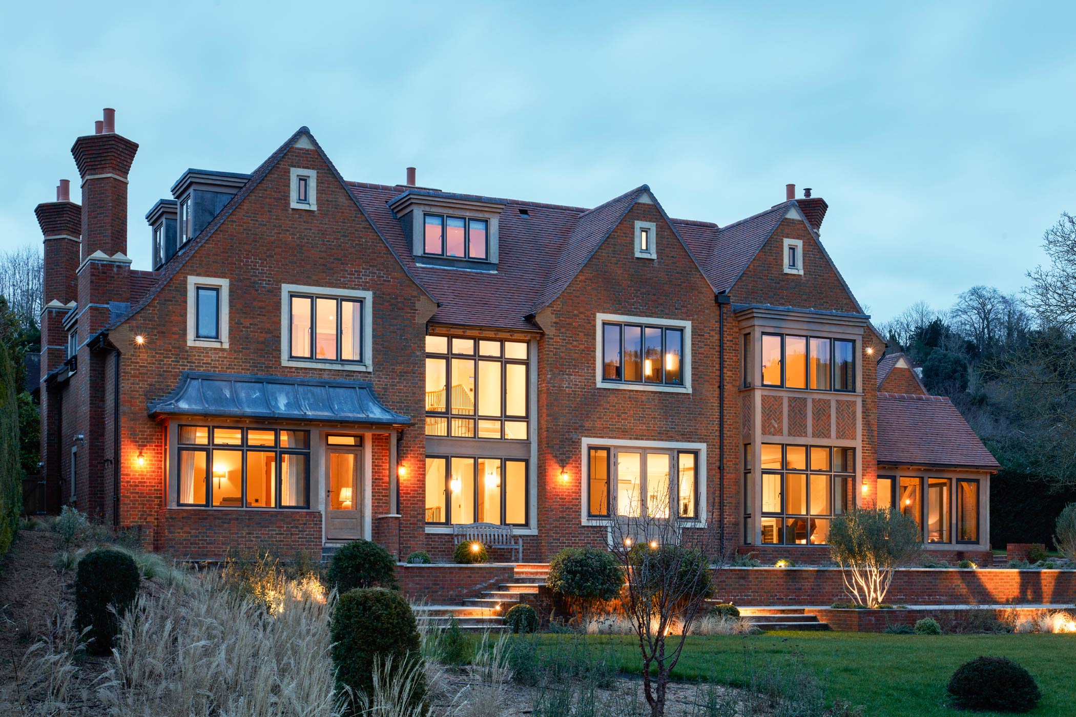Exterior rear view at dusk - New build by KM Grant Surrey