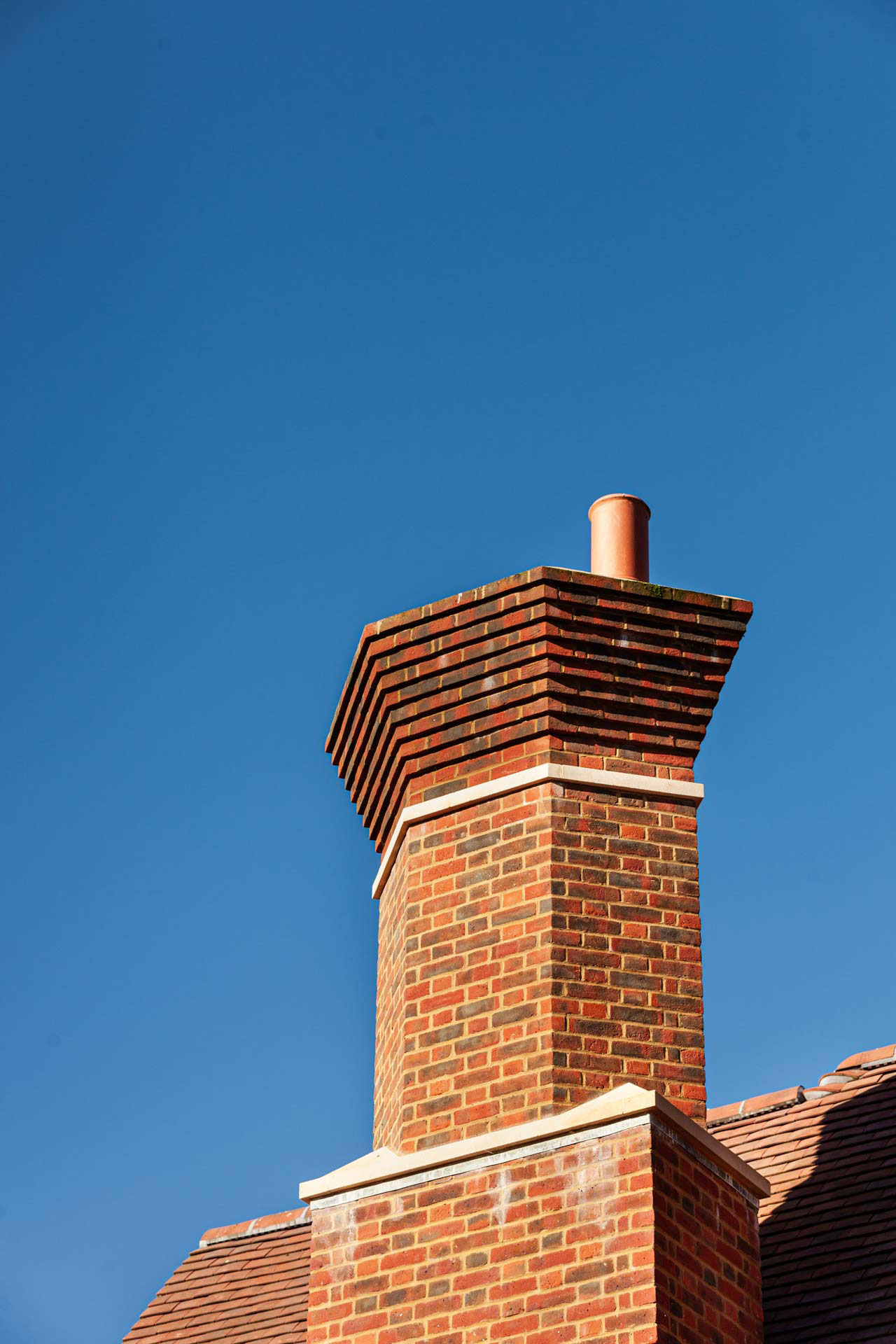 Exterior chimney detail - New build by KM Grant Surrey