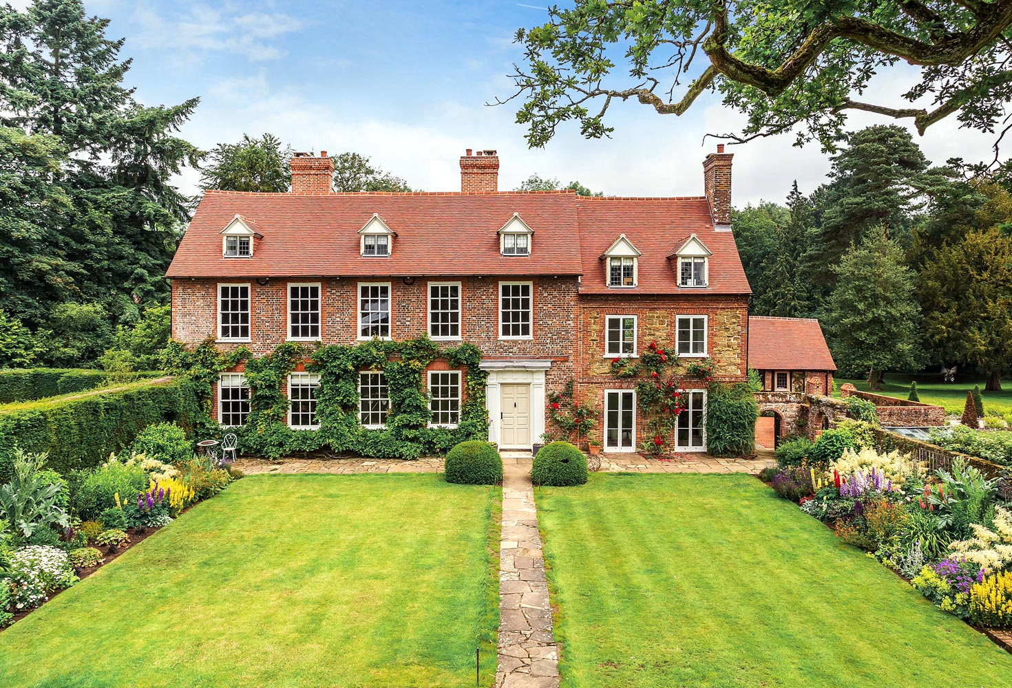 Grade 2 listed manor house - front. KM Grant