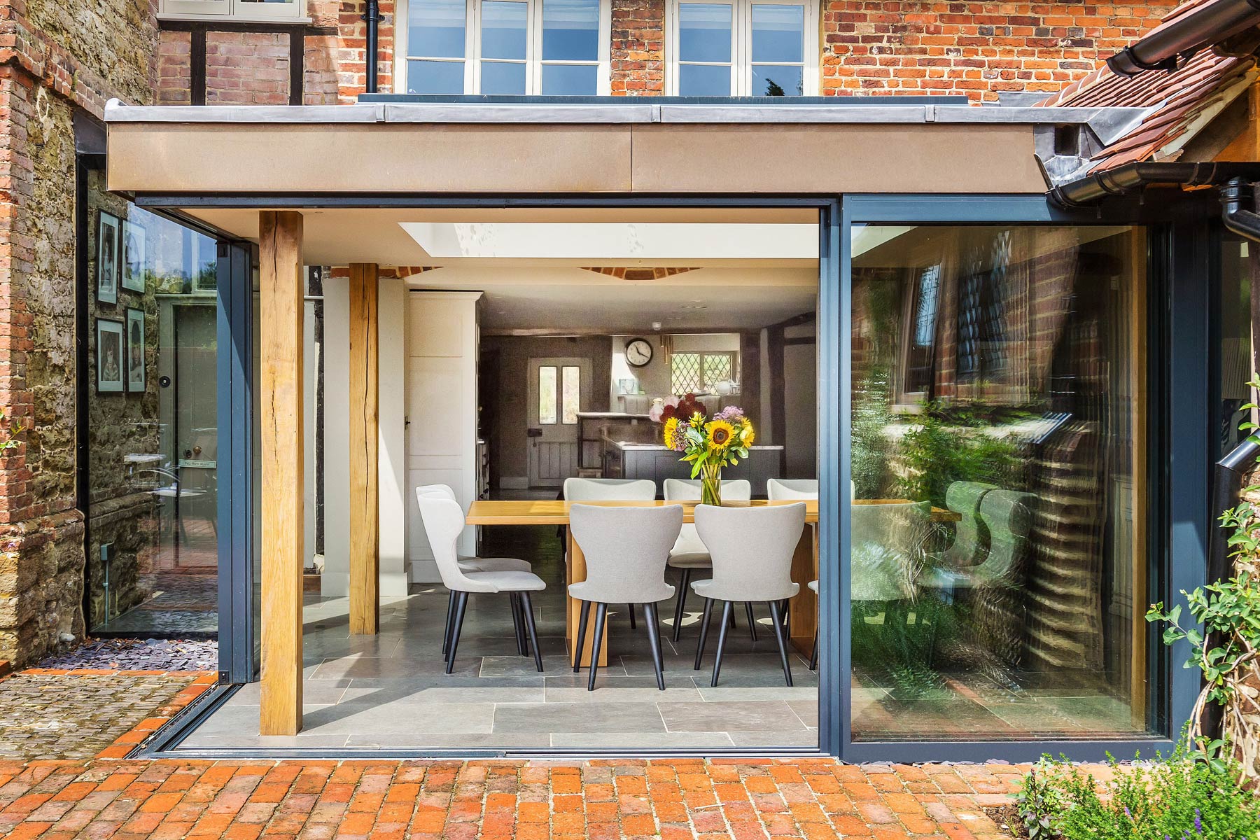 Grade 2 listed manor house glazed extension from outside KM Grant
